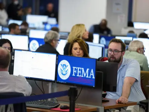 People work at FEMA headquarters, Thursday, Sept. 29, 2022, in Washington.
