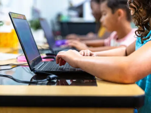 Elementary students in a computer lab.